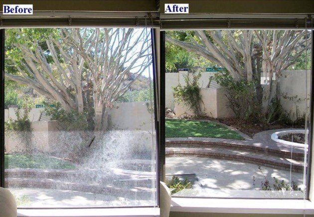 Before and after of a hard-water spotted window cleaned to clear glass