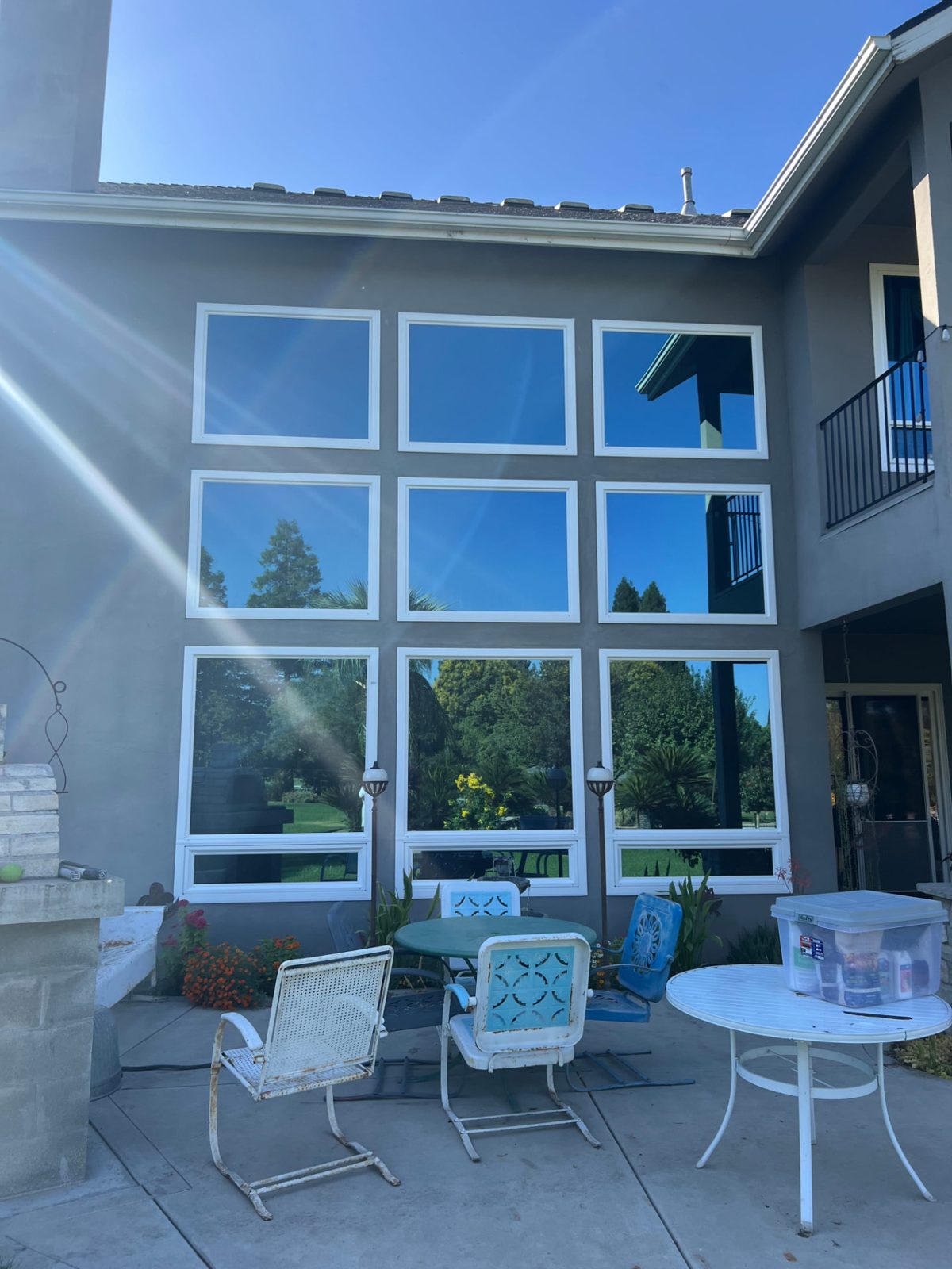 Grid of nine second-story windows cleaned streak-free on a Clovis home
