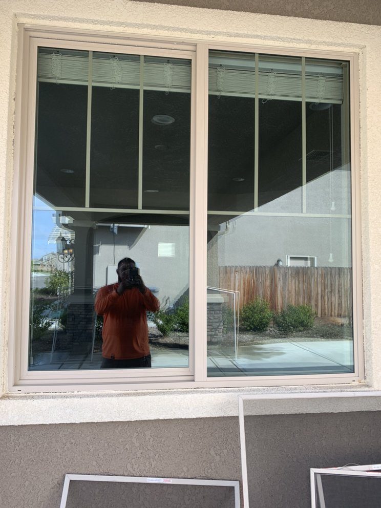 Cleaned sliding glass door and frame on a Central Valley home